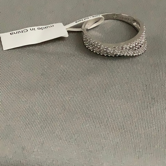 Delmar
Sterling Silver Multi Twist Pave Diamond Ri - Picture 4 of 5